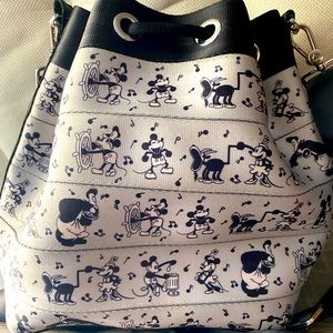 Harvey’s Disney crossbody and backpack. Sailboat willie Mickey